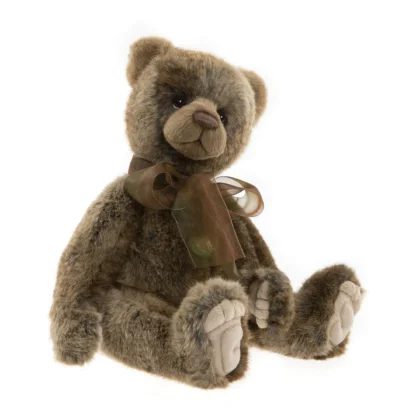 Ezra a traditional teddy bear style, his soft fur is mottled with mossy greens and rich browns giving him a very earthy look